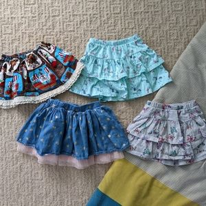 Lot of 4 toddler skirts